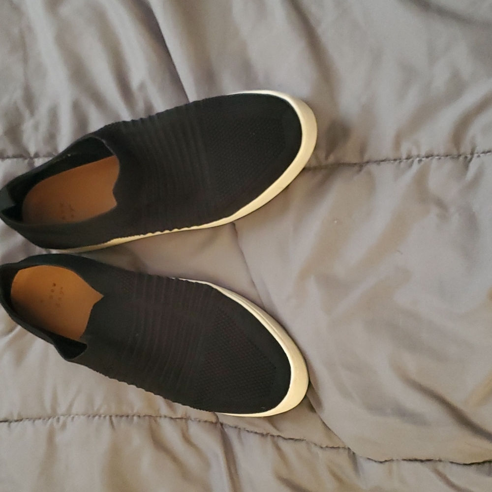 Black knit slip on sneakers